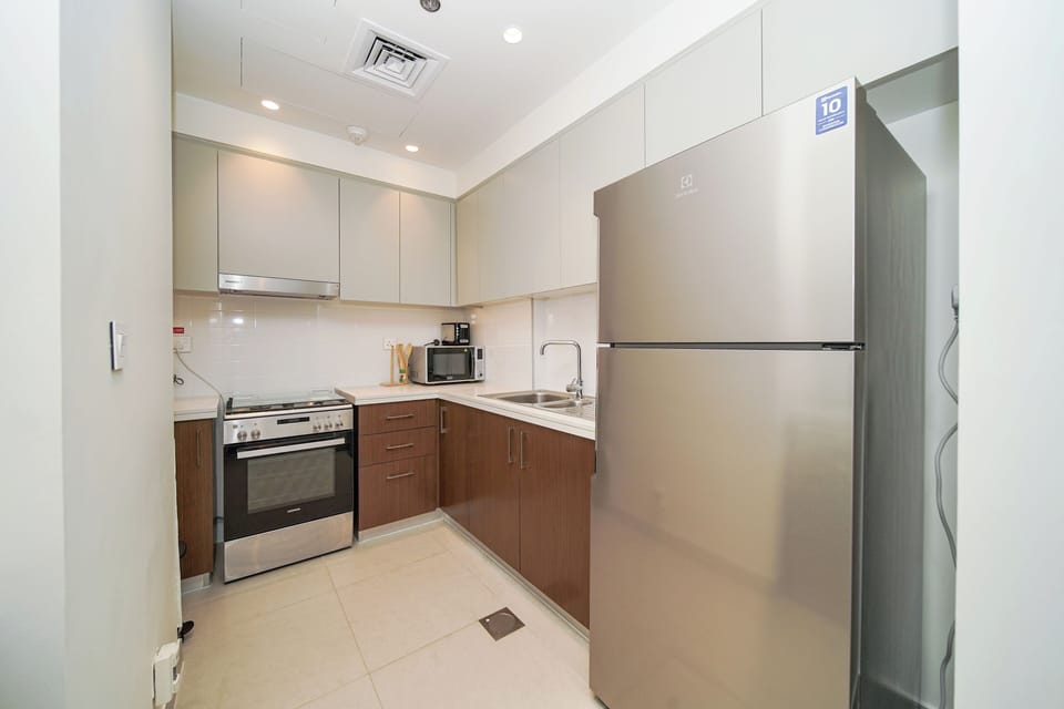 Luxury Apartment, Balcony, City View | Private kitchen | Full-size fridge, microwave, oven, stovetop
