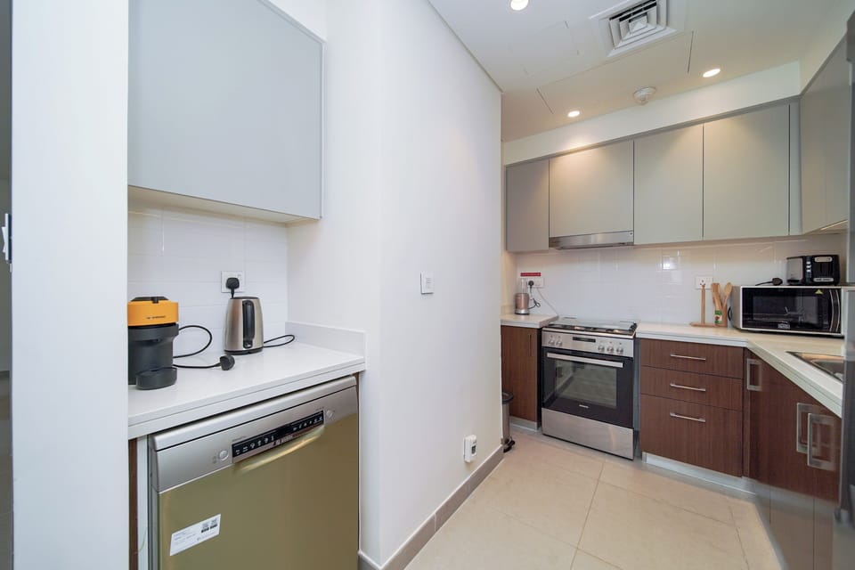 Luxury Apartment, Balcony, City View | Private kitchen | Full-size fridge, microwave, oven, stovetop