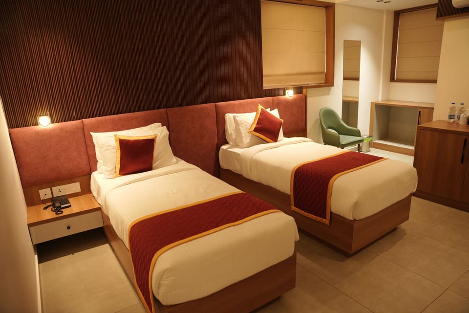 Deluxe Twin Room, Hill View | In-room safe, desk, laptop workspace, blackout drapes