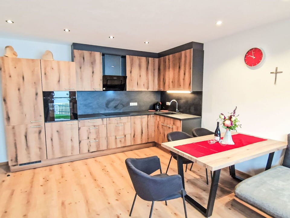 Furniture, Flooring, Interior Design, Wood, Floor, Wood Flooring, Ceiling, Room, Lighting, Cabinetry