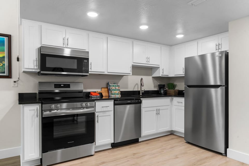 Condo, Multiple Beds, Balcony (Creekside Near the Landing) | Private kitchen | Fridge, microwave, oven, stovetop