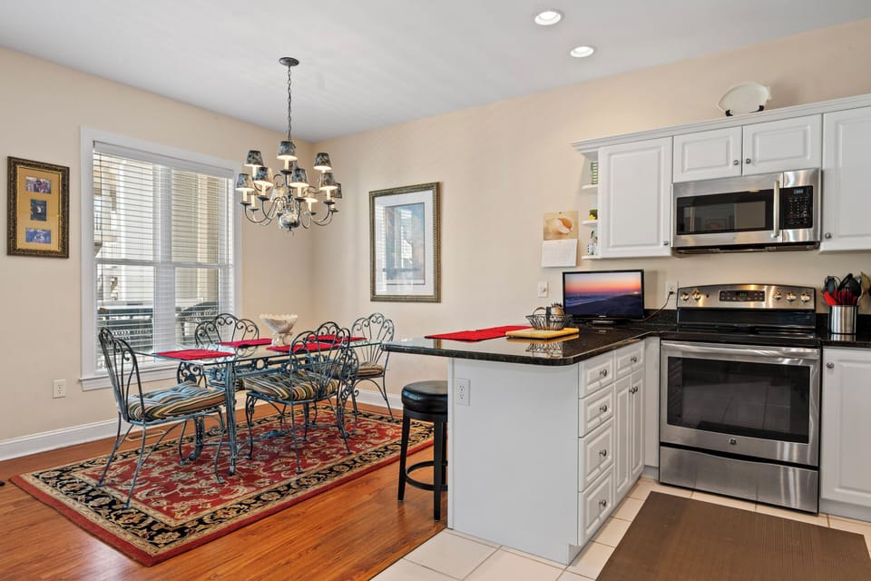 Your bright, open kitchen flows seamlessly into the dining area, perfect for cooking and sharing meals together.