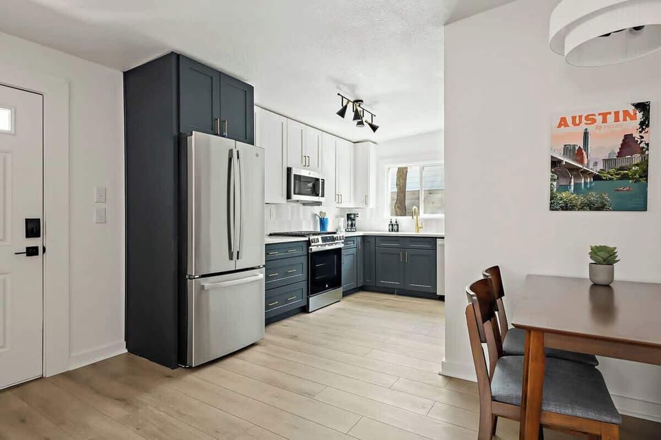 A cozy Austin, Florida retreat with a modern kitchen, ideal for quick bites or leisurely meals, showcasing the charm of Austin, Florida in Austin, Florida.