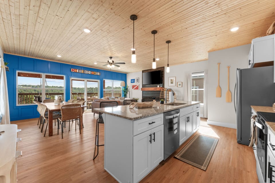 Living area and fully stocked kitchen on main floor.  