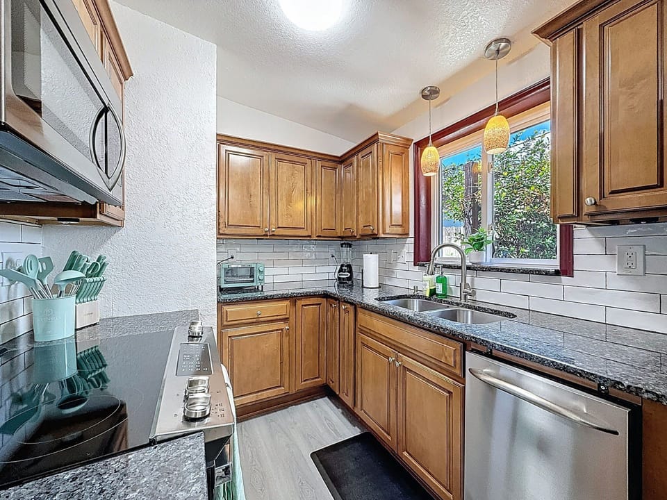 Kitchen with Granite Counter Tops and Stainless Appliances
