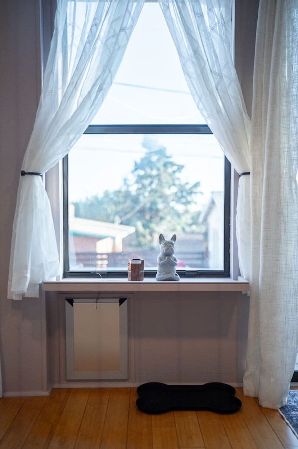 Charming decorative touches and thoughtful details enhance the cozy vibe of this space, creating a warm and welcoming atmosphere for guests to relax and feel at home.