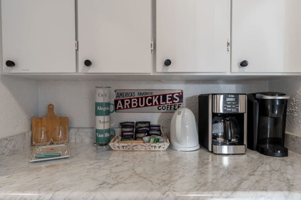 Start your mornings right with a fully stocked coffee and tea station, complete with a coffee maker, kettle, and a variety of blends—perfect for cozy mornings or energizing before a day of exploring.