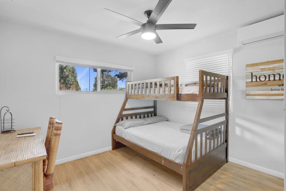 Bed Three (3) with air-conditioning, ceiling fan, and lots of natural sunlight