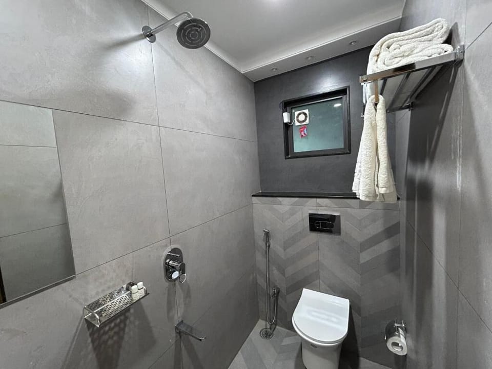 Shower, towels, soap, shampoo