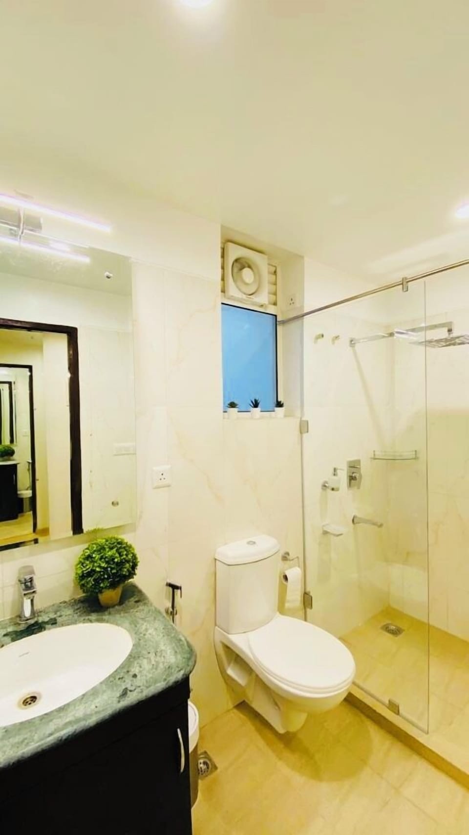 Shower, free toiletries, hair dryer, slippers