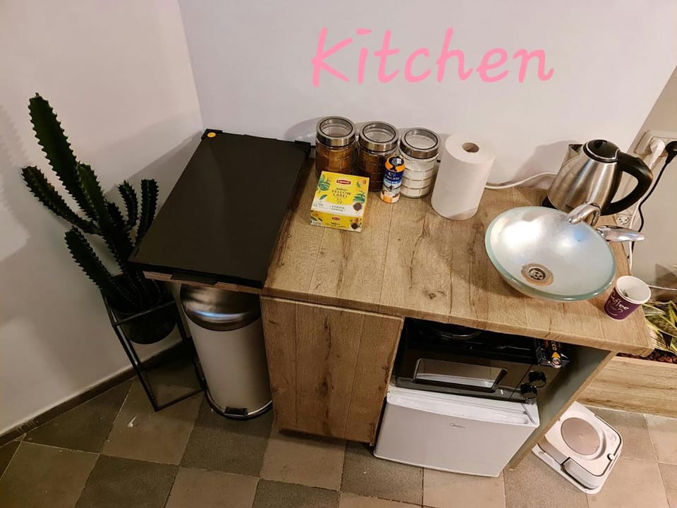 Fridge, microwave, cookware/dishes/utensils