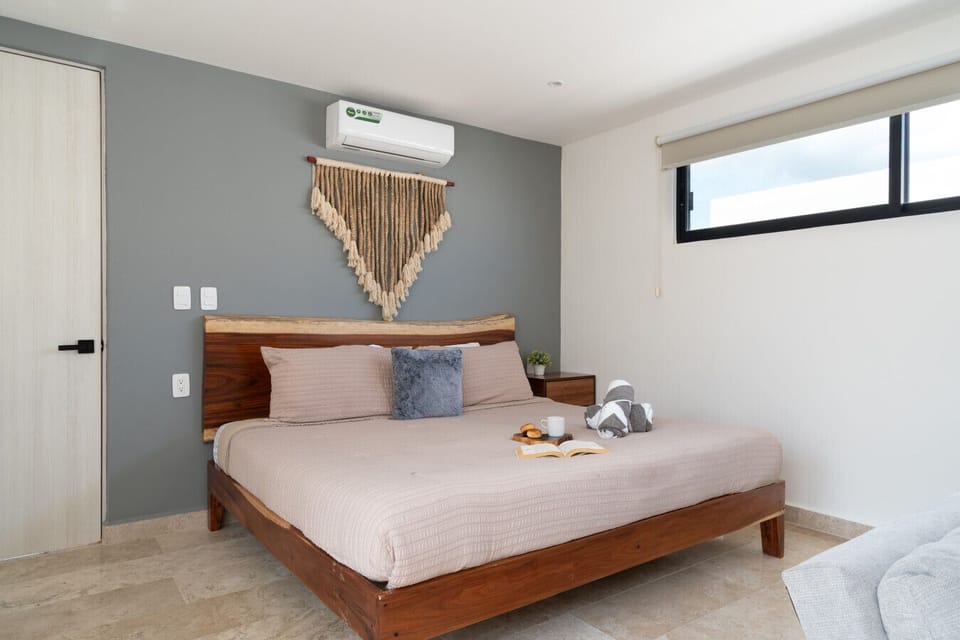 Luxurious king bed with soft bedding and relaxing comfort.