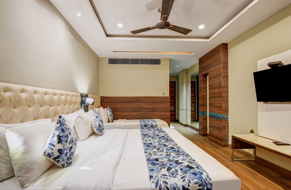 Superior Triple Room, City View | Desk, laptop workspace, soundproofing, iron/ironing board