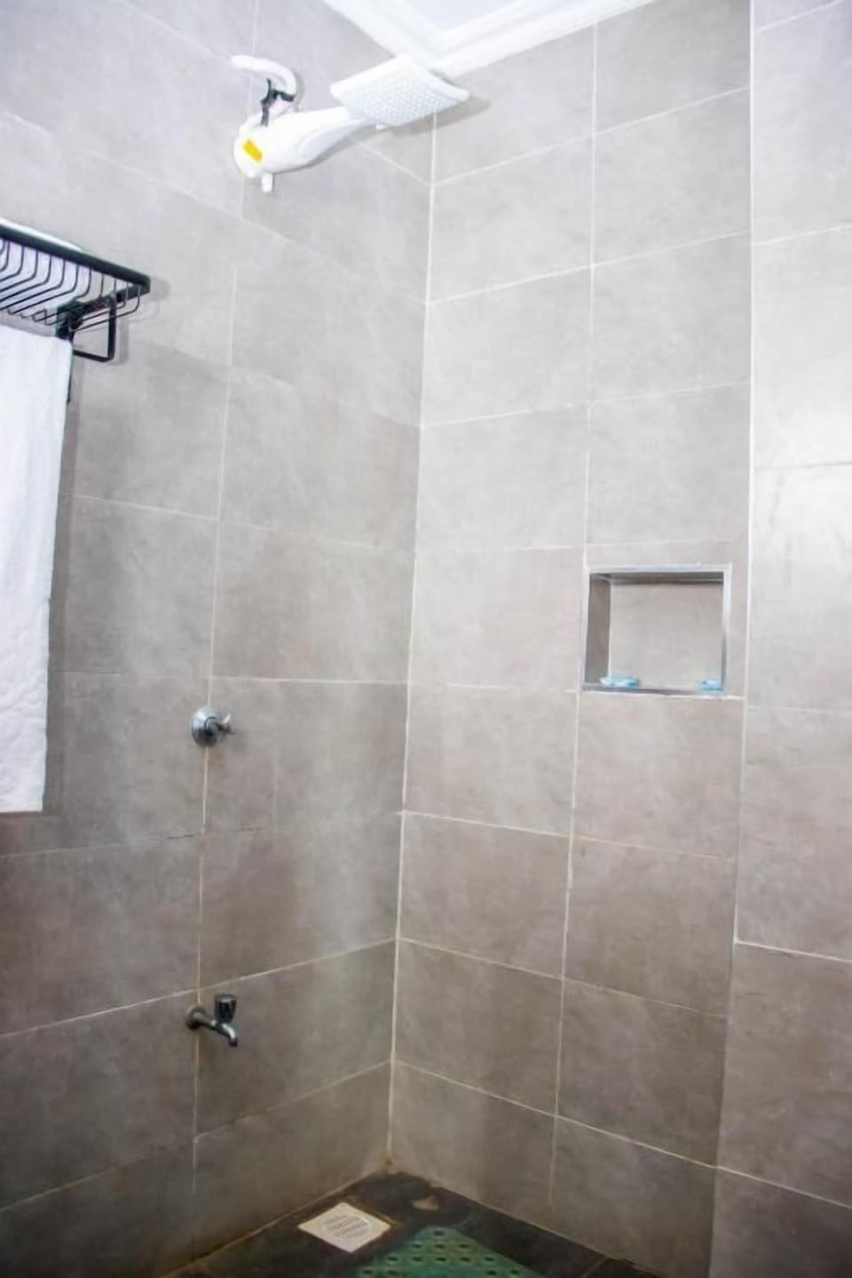 Shower, free toiletries, slippers, towels