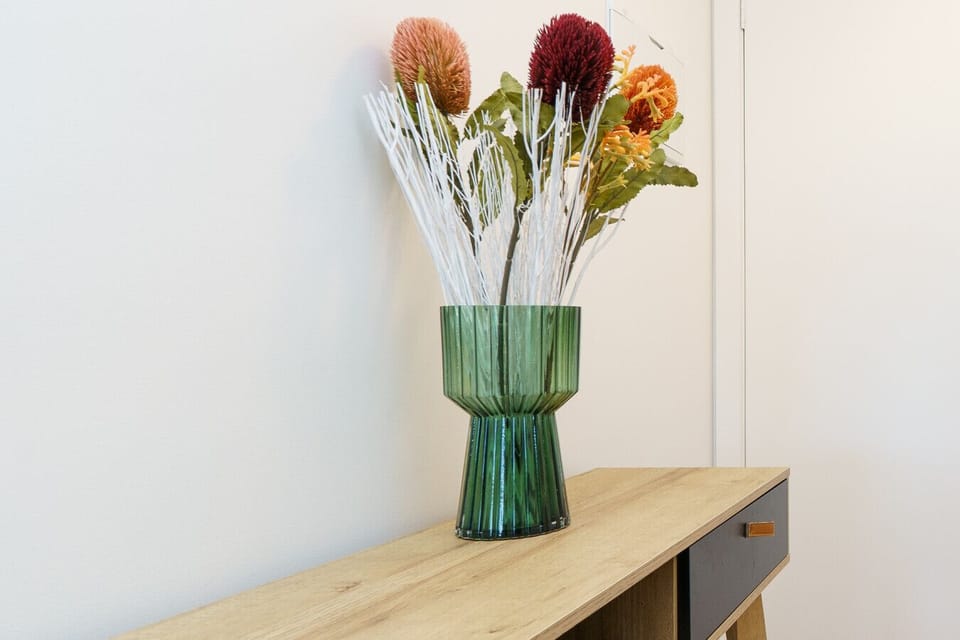 Minimalist design meets stylish accents for a welcoming feel.