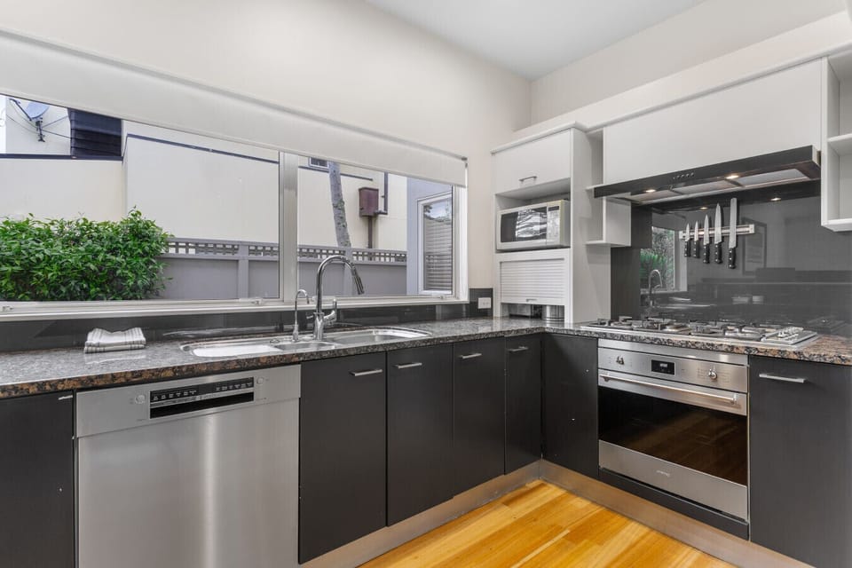 Fully equipped modern kitchen with gas hob