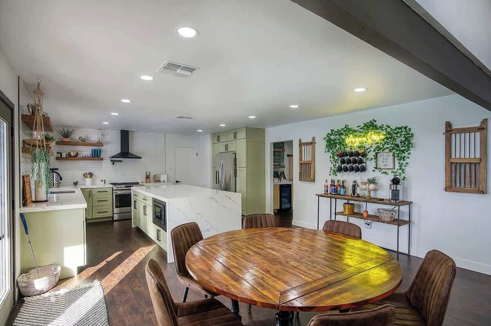 Dining area perfect for group meals, game nights, or planning your day.