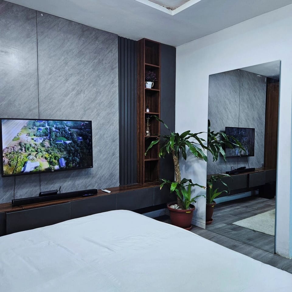 Family Room, Balcony, City View | Desk, laptop workspace, blackout drapes, soundproofing