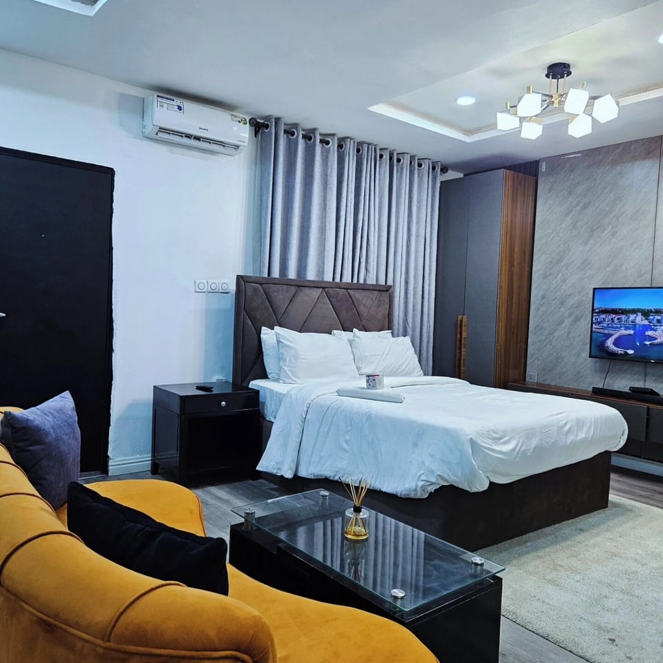 Family Room, Balcony, City View | Desk, laptop workspace, blackout drapes, soundproofing