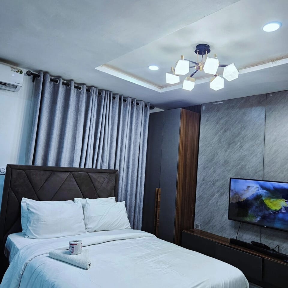 Family Room, Balcony, City View | Desk, laptop workspace, blackout drapes, soundproofing
