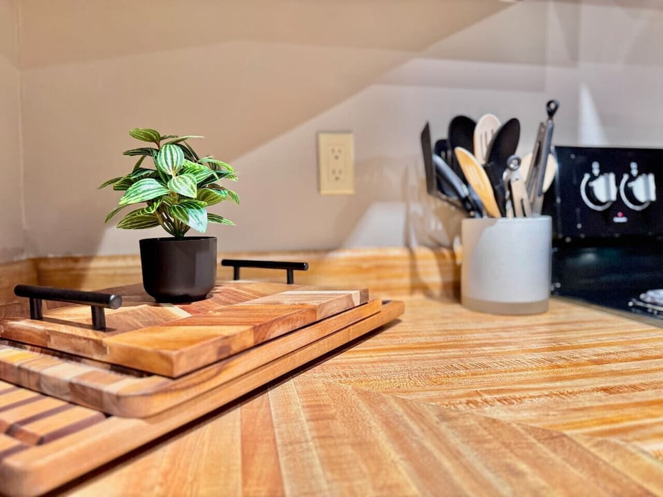 Cook your favorite meals in a cozy wood-accented kitchen.