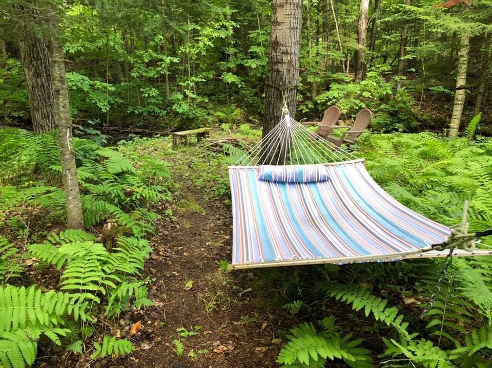 Take a snooze while listening to the babbling stream nearby.