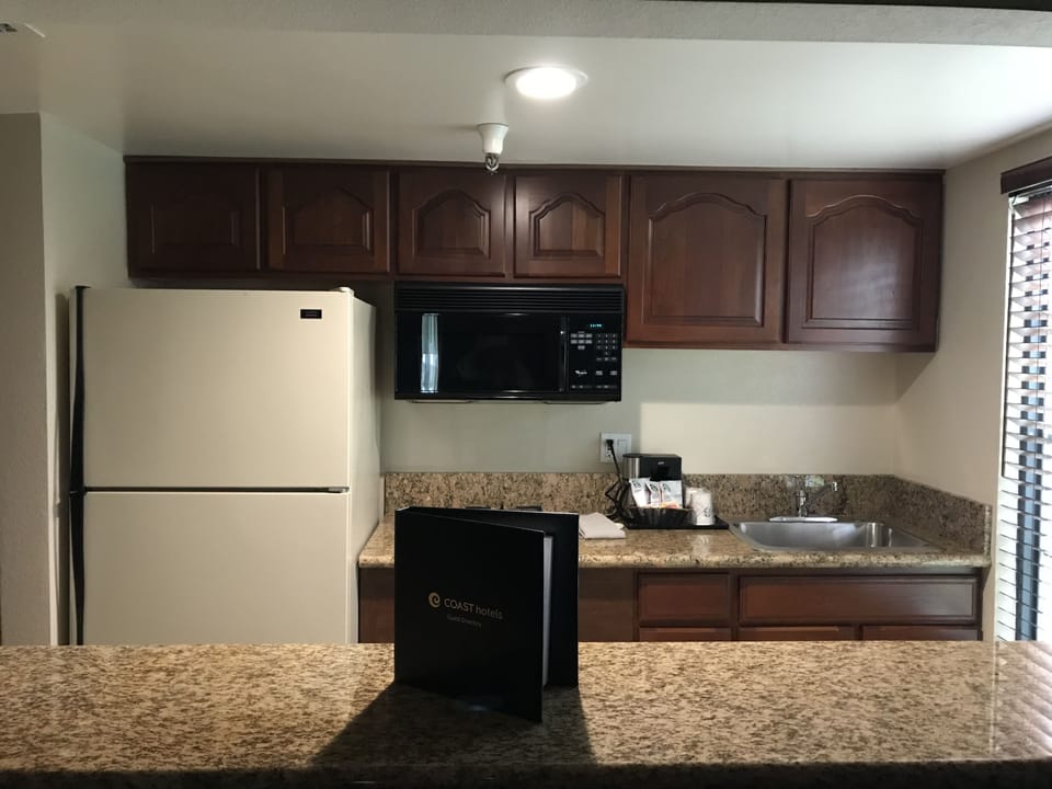 Suite, 1 King Bed (Coast Premium King Mini Suite ) | Private kitchen | Coffee/tea maker
