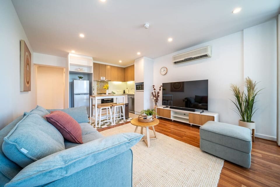 Enjoy a relaxed evening in, streaming a film or chatting with city lights just beyond the glass.