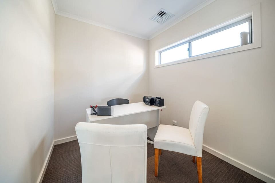 Tucked away from the main living spaces, the dedicated home office provides a quiet spot to catch up on work, plan the day, or enjoy a moment of focus while travelling.