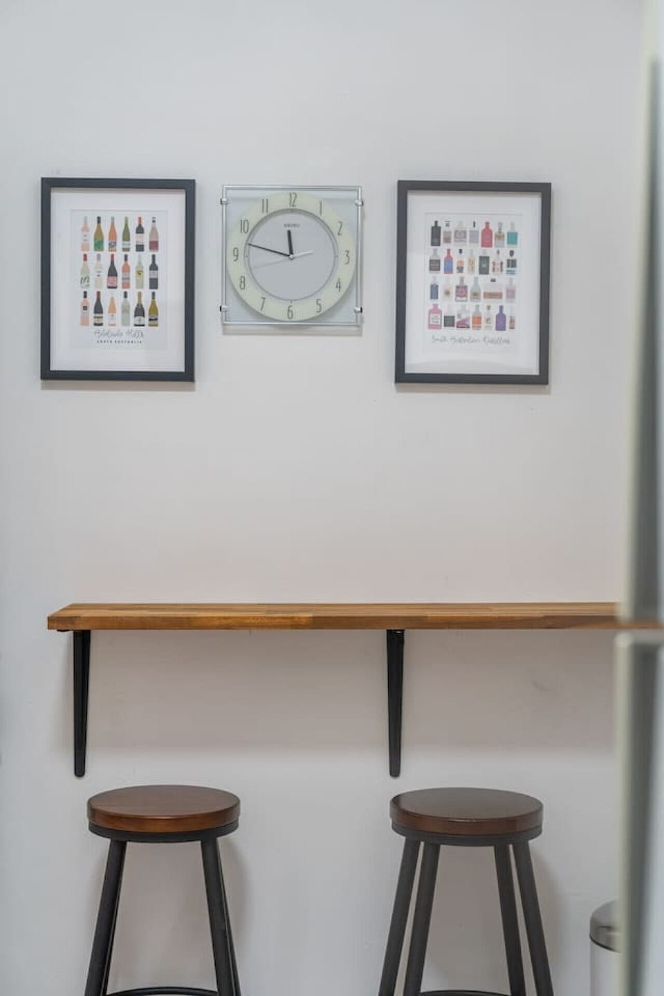 A bar table setup offers a casual spot for a morning coffee or a quick bite.