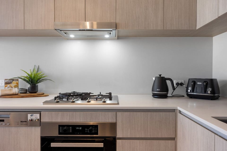 Prepare meals with ease in a well-equipped kitchen designed for everyday convenience.