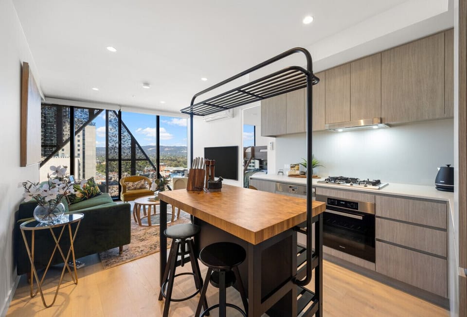 Cook and connect in the open-plan kitchen, designed for easy meals and shared moments.