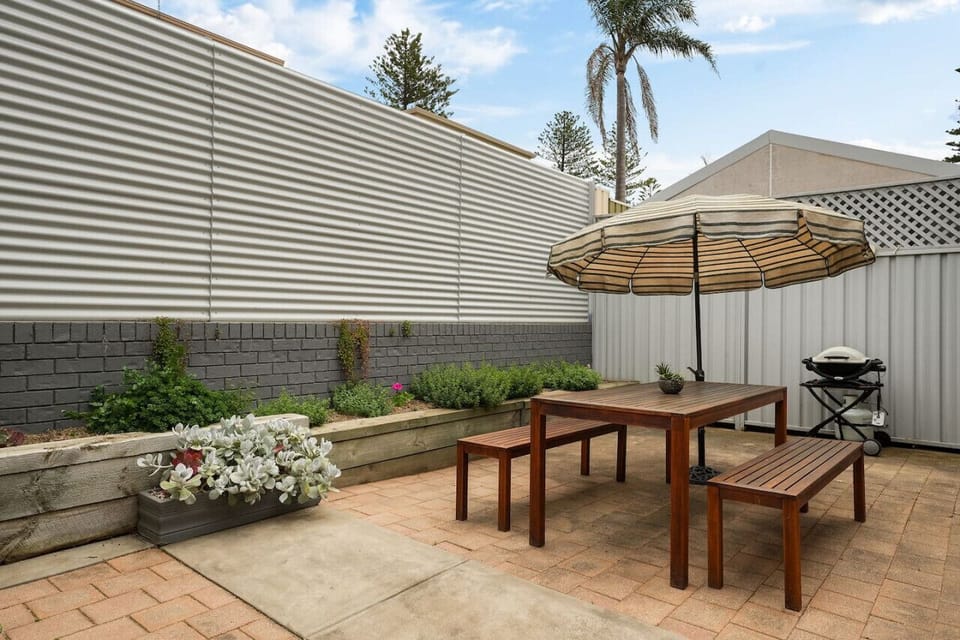 Fire up the BBQ and settle into the courtyard dining area for easy alfresco evenings after sunset walks along the shoreline.