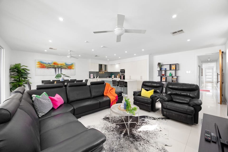 Vibrant cushions, chilled layout, and zero clutter — this zone is clearly built for good times.