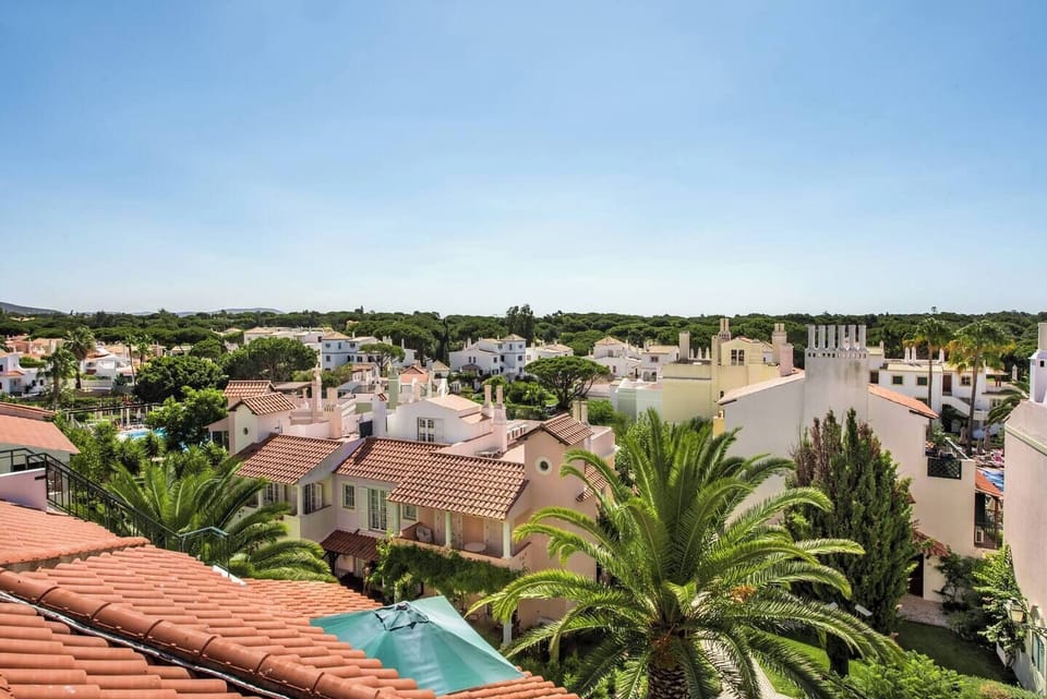 View from roof terrace with left the Dolphin pool and right the Main pool