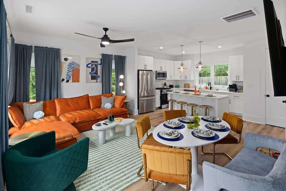 Open concept design blends dining, kitchen, and living spaces beautifully.