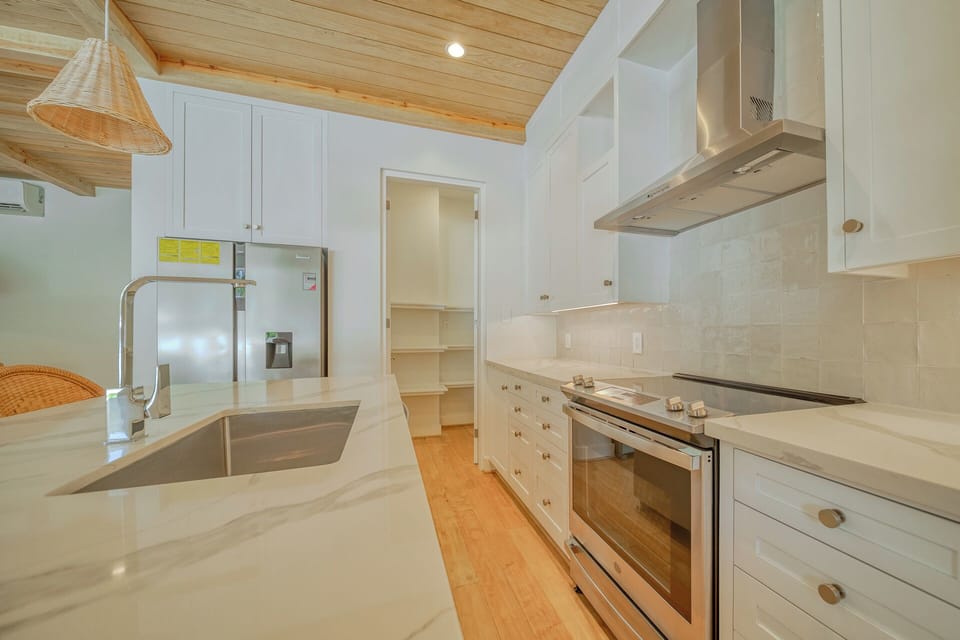 Luxury Condo, 2 Bedrooms | Private kitchen | Coffee/tea maker
