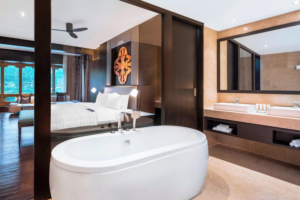 Grand Suite, 1 King Bed with Sofa bed, River View | Bathroom | Separate tub and shower, deep soaking tub, designer toiletries