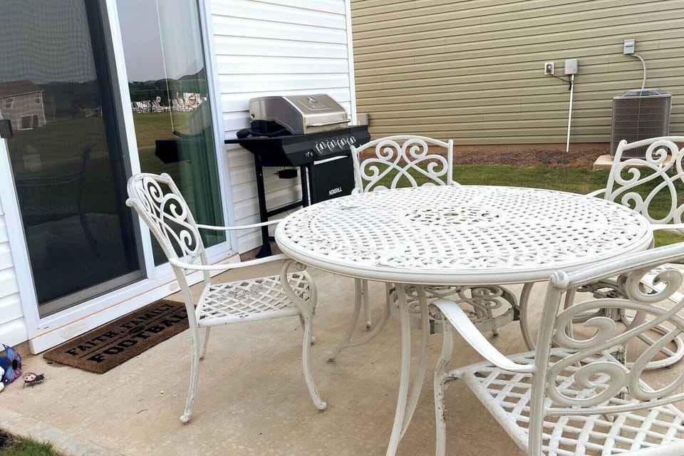 Back patio table and gas grill
Seat cushions are kept inside