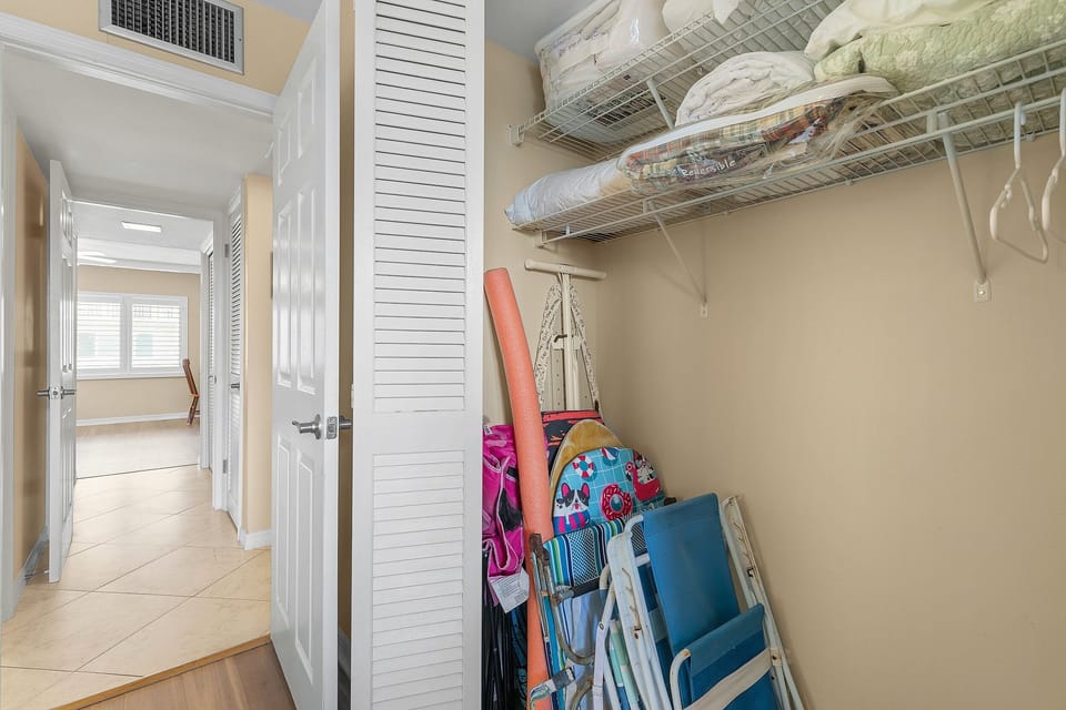 This stocked beach gear closet includes chairs, toys, and essentials—everything you need for a fun-filled beach stay just steps from the shore.