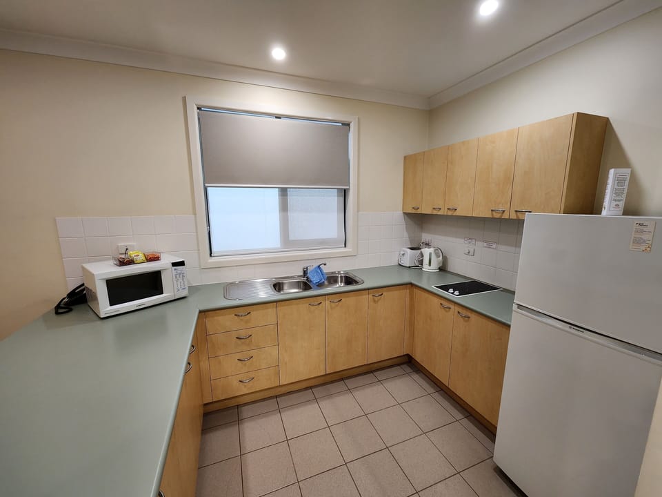 Comfort Apartment, 2 Bedrooms, Kitchen, Courtyard Area | Private kitchen | Full-size fridge, microwave, cookware/dishes/utensils