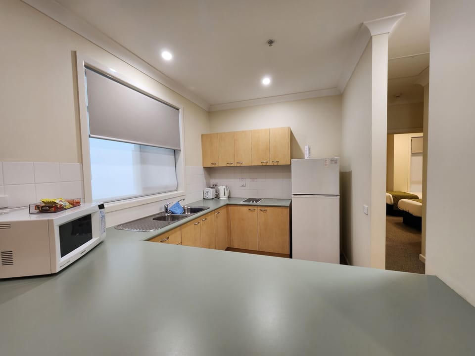 Comfort Apartment, 2 Bedrooms, Kitchen, Courtyard Area | Private kitchen | Full-size fridge, microwave, cookware/dishes/utensils