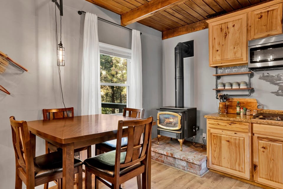 Open kitchen and dining space with modern décor and bright natural light.