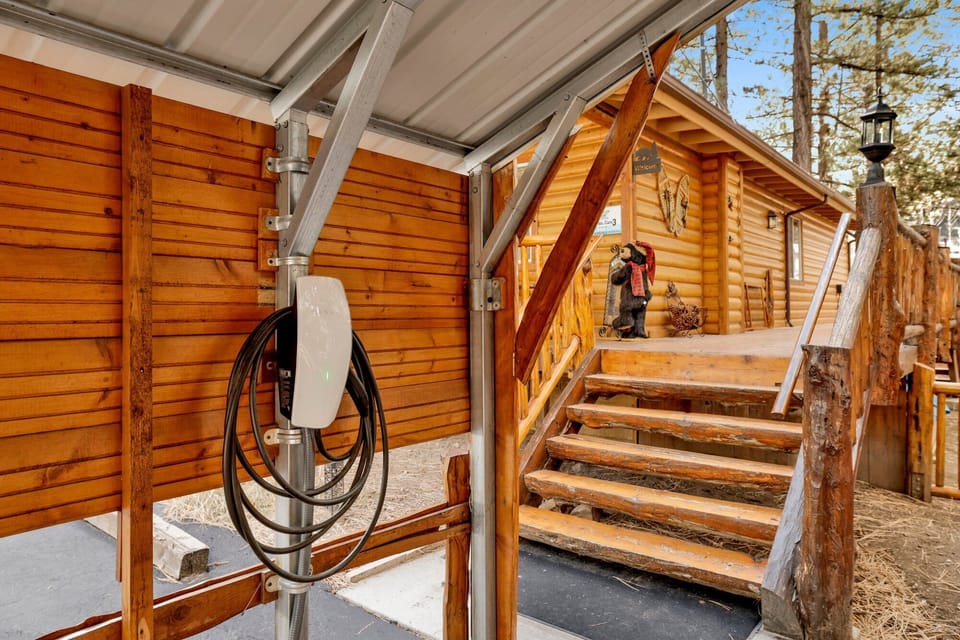 Enjoy the convenience of a covered carport along with an on-site EV charger, making arrivals and departures easy in any season.