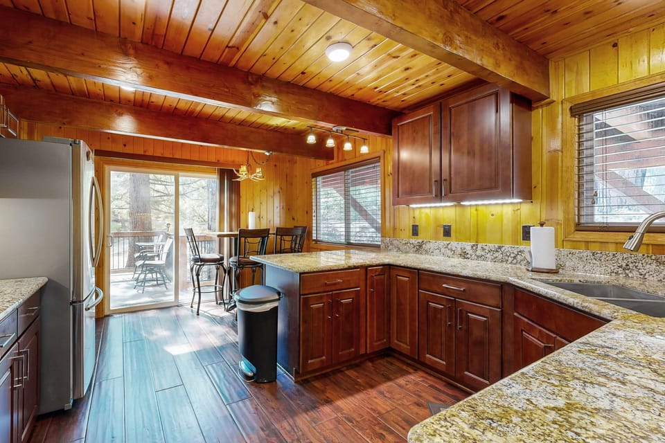 A modern, well-equipped kitchen for home-cooked meals. Please note: this kitchen does not include a dishwasher.