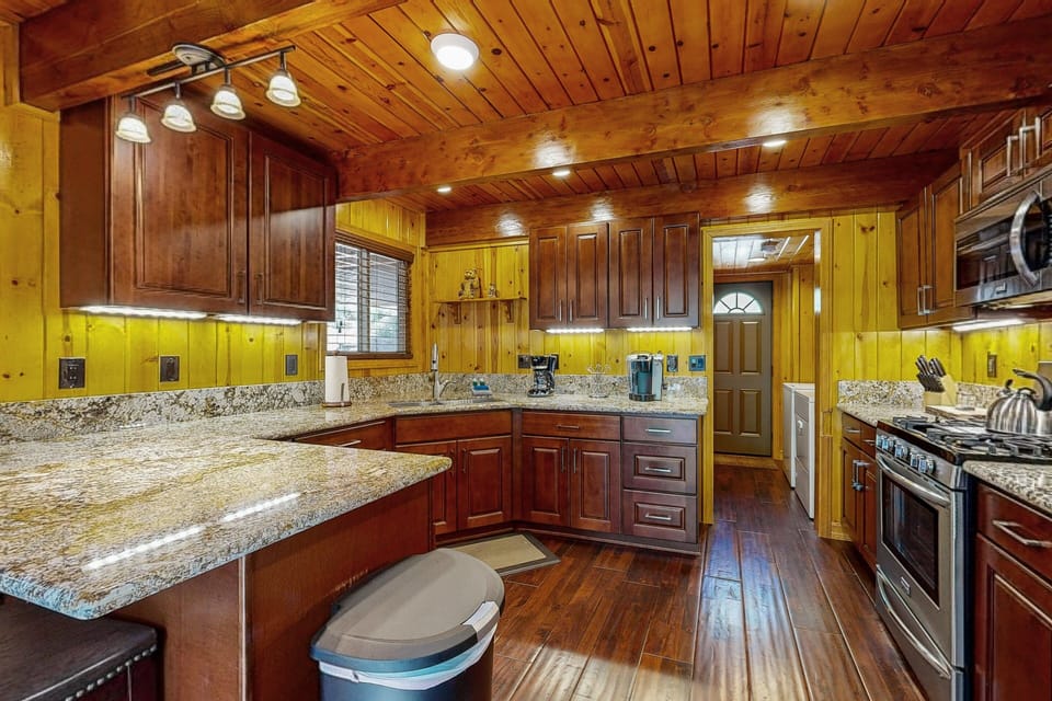 A modern, well-equipped kitchen for home-cooked meals. Please note: this kitchen does not include a dishwasher.
