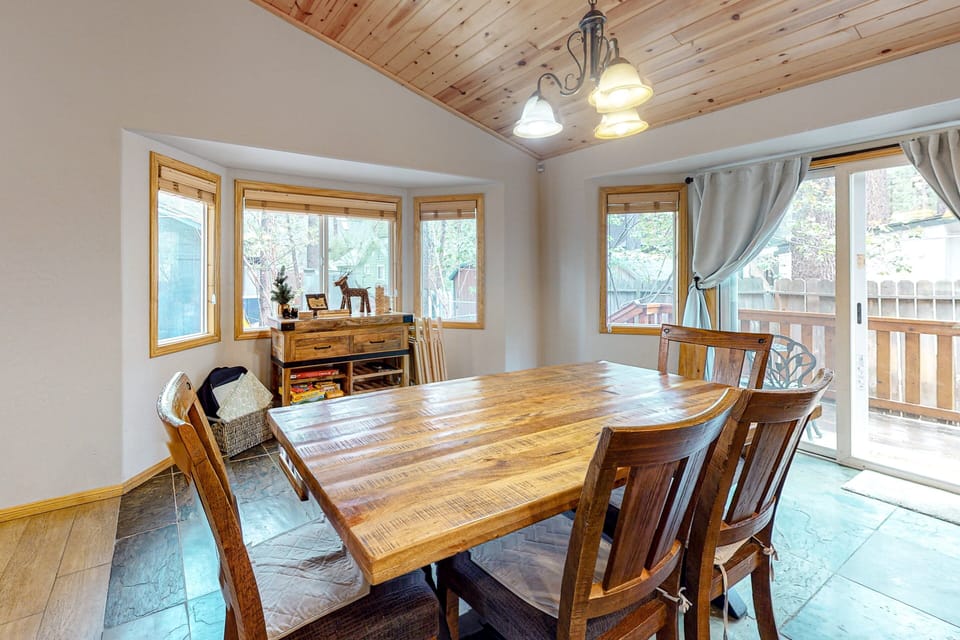 Fully equipped cabin kitchen with ample cabinetry, stove, fridge, microwave, and coffee maker—perfect for cooking meals, morning coffee, and feeling right at home on your stay.
