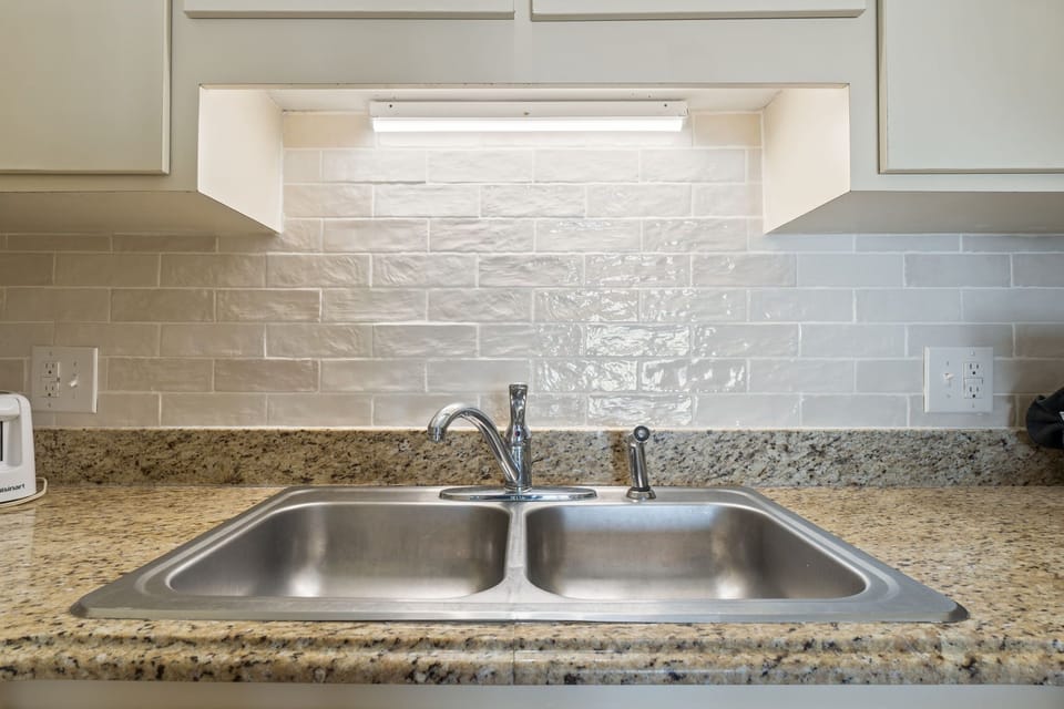 Kitchen sink with brand new backsplash