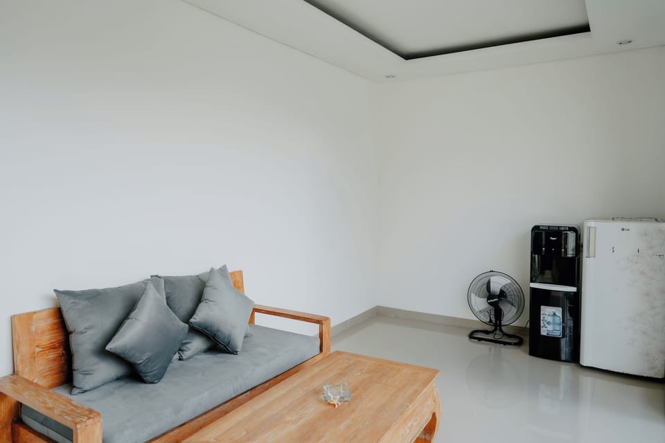 Deluxe Villa, Private Pool, Pool View | Living area | 43-inch LED TV with cable channels, fireplace