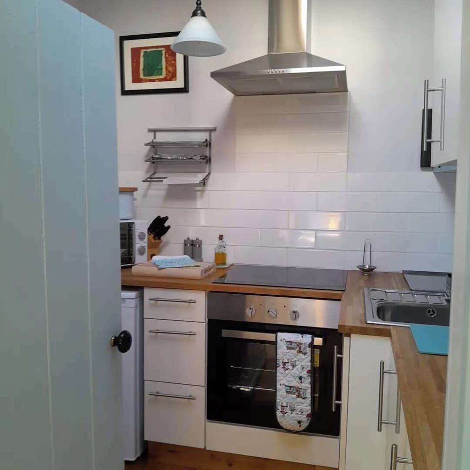Small but fully equipped kitchen.
Full oven, Hob, microwave,Nespresso coffee machine, toaster and kettle. There's even a milk brother for your cappuccino.